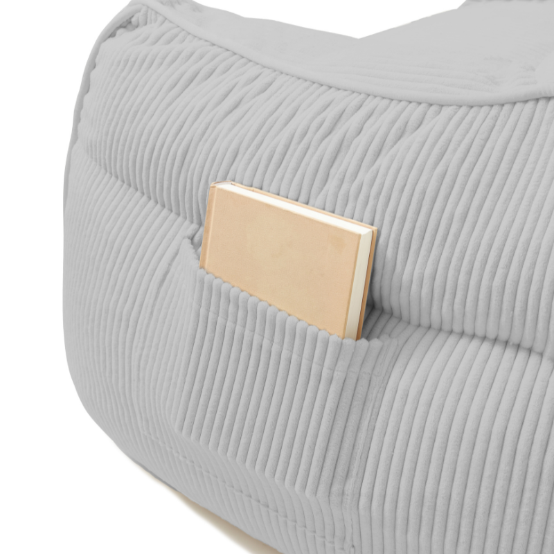 Pouf fauteuil en velours côtelé