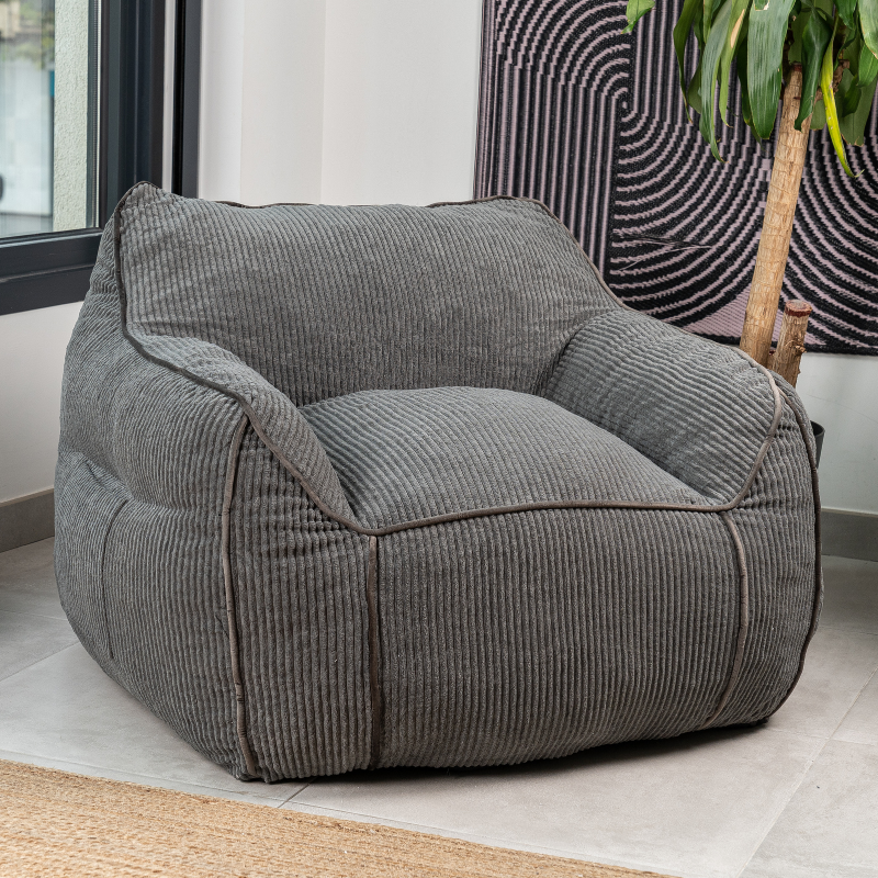 Pouf fauteuil en velours côtelé