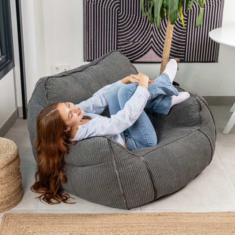 Pouf fauteuil en velours côtelé